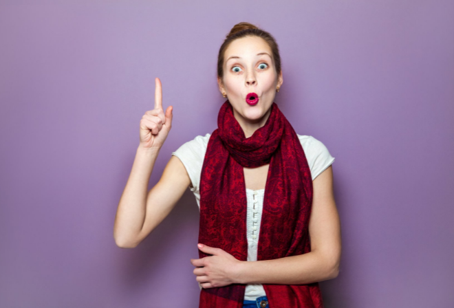 surprised woman pointing up nonverbal communication