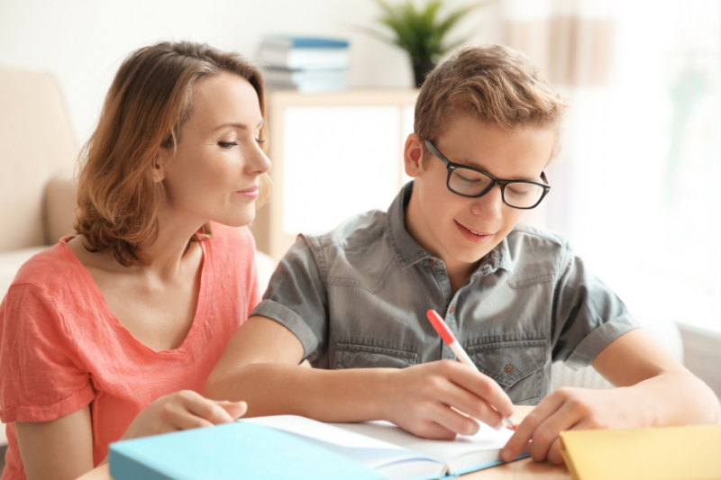 Teen planning a morning routine with parent