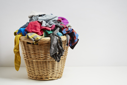 Organizing basket of dirty laundry