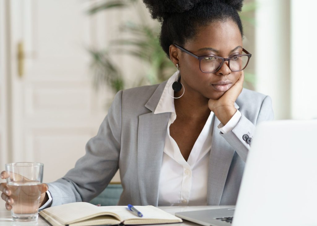 Woman focused on computer