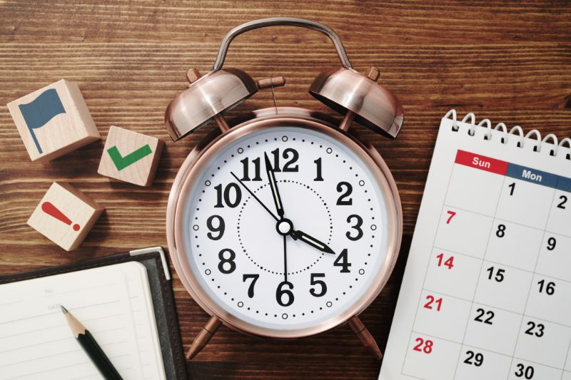 clock notebook calendar time management tools
